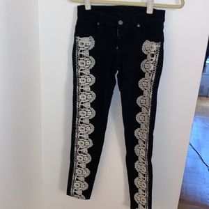 Carmar black skinny jeans with white lace detail